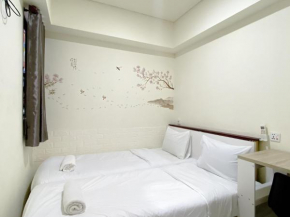 Great Homey 2BR at Meikarta Apartment By Travelio